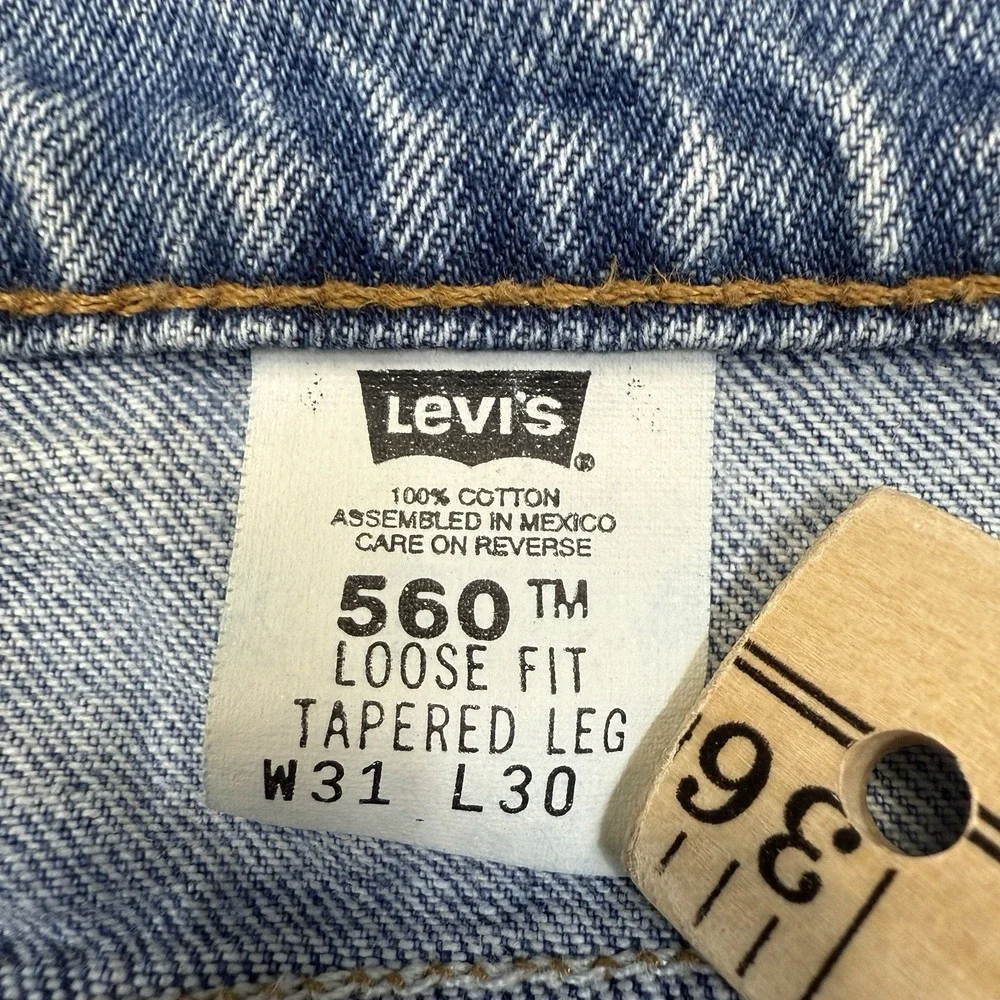 Vintage Levi's 560 Orange Tab Jeans Men's 31x30 Loose Fit Tapered Leg 90's